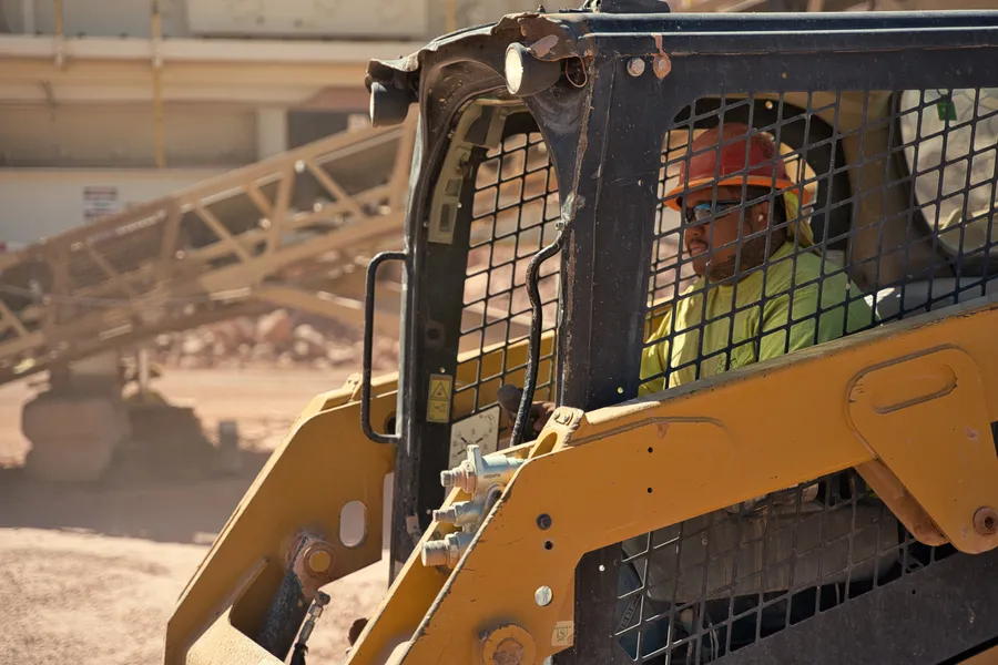 impact sand and gravel CAT wheel loader operator during day shift in southern nevada